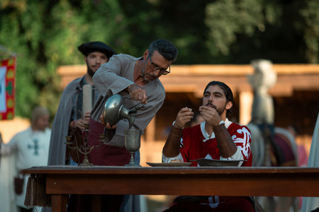 SANTA MARIA DA FEIRA, PORTUGAL - AUG 3, 2023: During annual Viagem Medieval festival. The 26th edition of the event takes place in historic city center, with a recreation of the reign of King Joao I.のeditorial素材