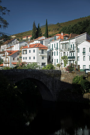 View of the pedestrian bridge in Vide (Seia) in the foot of Serra da Estrela, Portugal.の写真素材