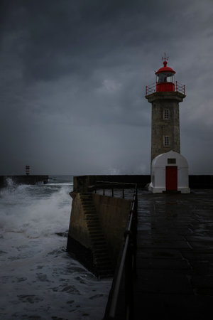 An ocean lighthouse in overcast weather. Porto, Portugal.の写真素材