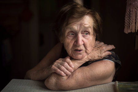 An old woman in her own home.の写真素材