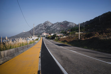 The yellow stripe on the pilgrim route on the Way of Santiago in Galicia.の写真素材