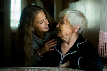 A teen girl visits her old grandmother.