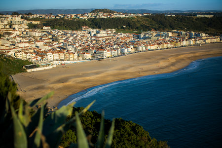 A view from the lighthouse overlooking the city and beach of NazarÃ©, Portugal.の写真素材