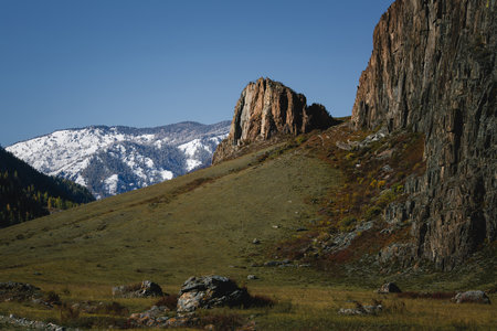 A rugged landscape with dramatic rock formations in the Altai Republic, capturing the raw and powerful essence of untamed nature.の写真素材
