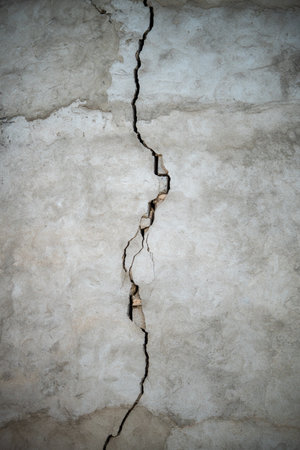 Closeup of cracked wall of house destroyed during strong earthquake in Turkeyの写真素材