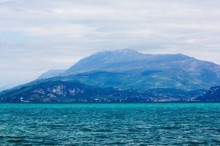 Great view of Lake Garda from Sirmione beach Lido delle Bionde, Italy 2016の写真素材
