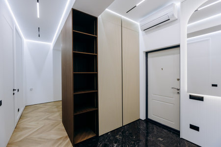 Explore modern hallway designs with sleek storage solutions for improved function and styleの写真素材