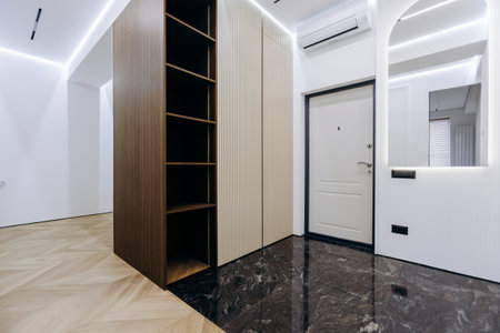 The modern entryway combines a stylish design with innovative storage for function and aestheticsの写真素材