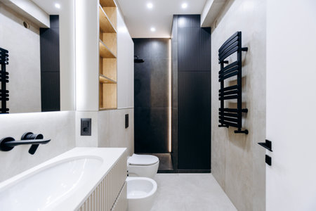 Explore a Modern Minimalistic Bathroom Design that includes Contemporary Fixtures and Finishesの写真素材