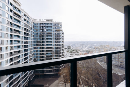 An Impressive Modern Urban Balcony View Featuring Stylish and Unique Architecture Designsの写真素材