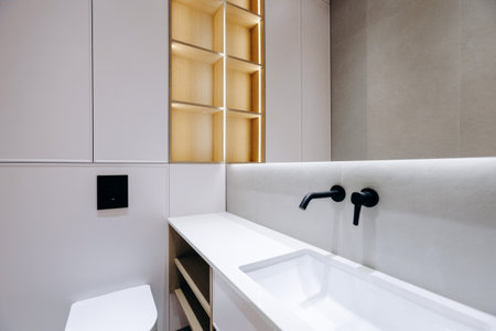 The Modern Minimalist Bathroom has a sleek design with stylish elements enhancing ambianceの写真素材