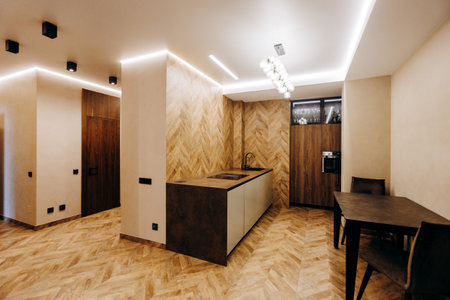 A Modern Kitchen Interior Featuring an Elegant Design and Beautiful Ambient Lighting Optionsの写真素材