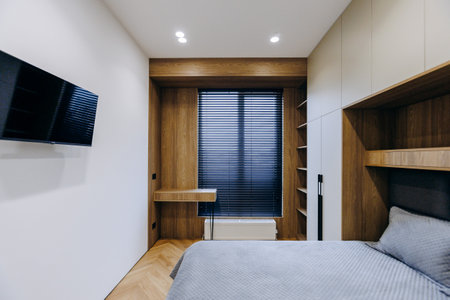 Discover the modern minimalist bedroom with sleek designs that enhance comfort and aestheticsの写真素材