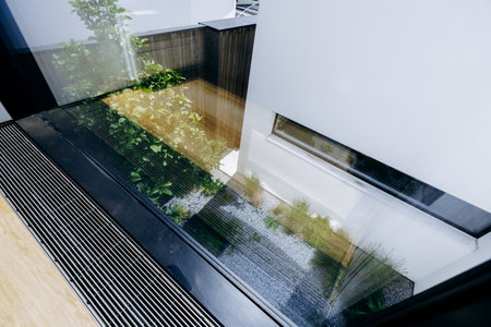 A clear reflection can be seen in a glass windowの写真素材