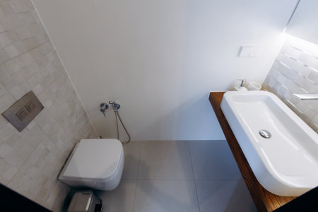A Modern Bathroom Design Featuring Elegant Fixtures with a Minimalist Style Approachの写真素材