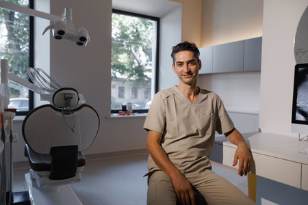 A modern dentist office featuring a practitioner working in a contemporary, stylish settingの写真素材