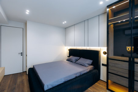 Discover a Modern Minimalist Bedroom with Stylish Storage for better organization and beautyの写真素材