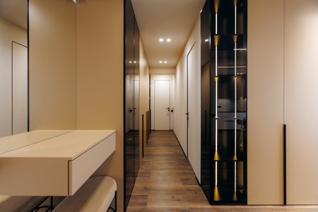 Discover the beauty of a Modern Minimalist Hallway Design that features Elegant Storage Solutionsの写真素材