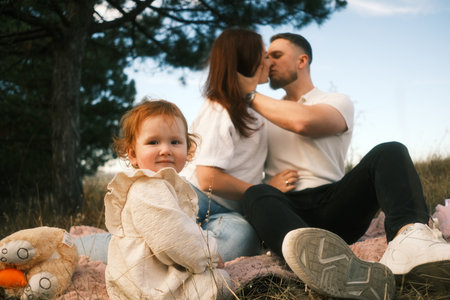 Cherished Family Moments Captured in the Beautiful Embrace of Natures Serene Landscapesの写真素材