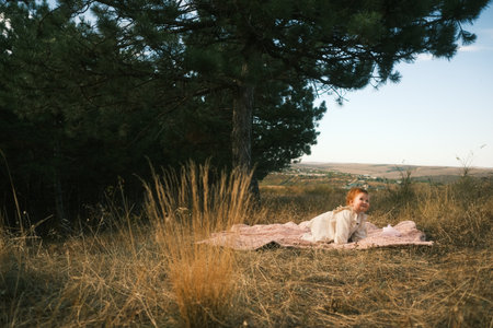 A blissful and dreamy outdoor portrait captured beautifully amidst the serene nature settingの写真素材