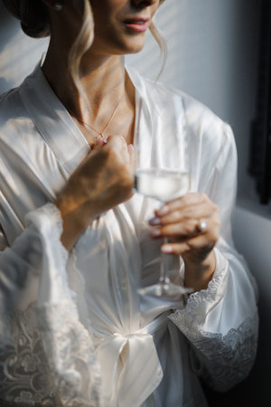 Woman bride is beautifully accented with elaborate jewelry piecesの写真素材