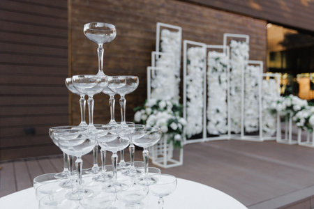 Refined drink presentation at outdoor wedding celebrationの写真素材