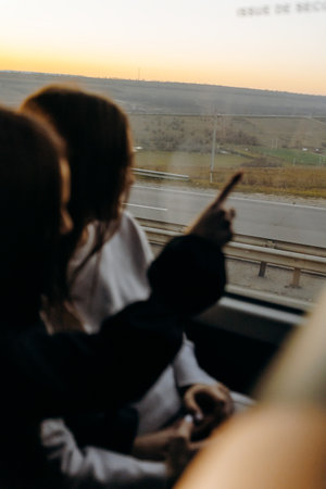 Travelers enjoy scenery, Two tourists quietly observe scenicの写真素材