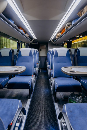 Views of blurred greenery through expansive panoramic windowsの写真素材