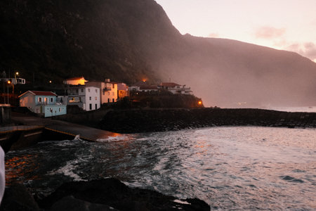 Serene seaside village illuminated by gentle dusky glow
