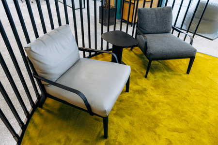 Comfortable Seating With Vibrant Decor, Charming Nook With Cushions And Contrasting Metal Railing