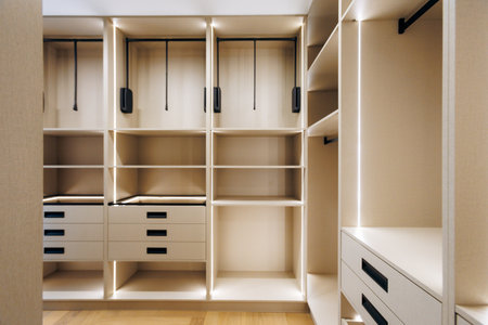 Versatile closet featuring modular storage and integrated illuminationの写真素材