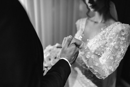 Emotionally charged scene capturing wedding vows and tenderの写真素材