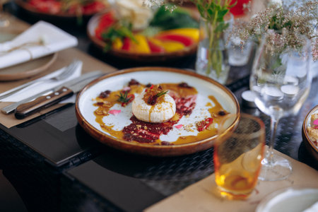 Delicate pastry with fruits and floral adornments setting mood