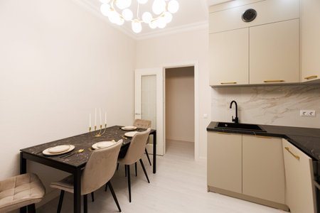 Intimate breakfast area featuring delicate curtains and subtle illuminationの写真素材