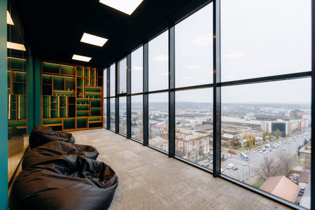 Expansive Corridor Offering Panoramic Urban Vistas And Casual Spaces For Socializing Or Work