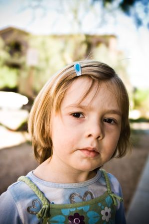 A three year old child playing.