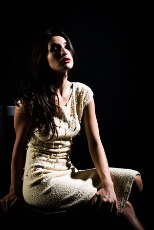 A young female model, photographed in the studio.