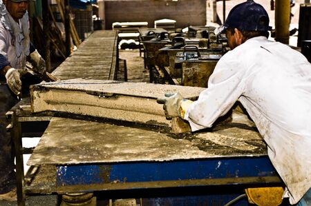 Work at the masonry factory, production of building materials.の写真素材
