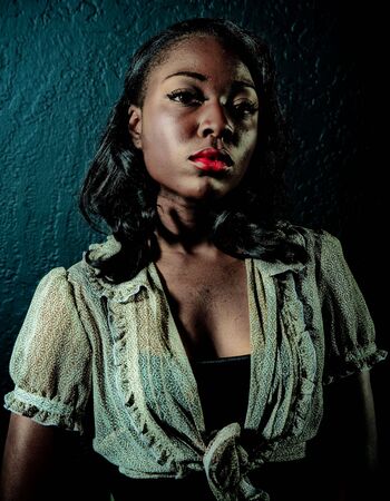 A young african american girl, photographed in the studio.の写真素材