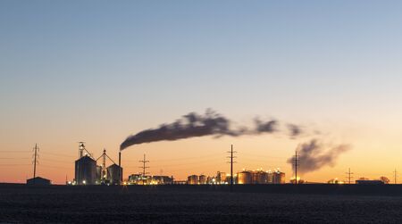 Ethanol factory early morning smoke risingの写真素材