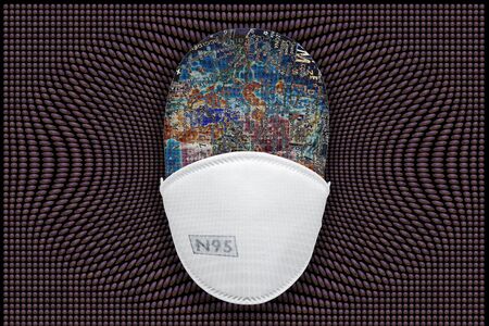 N95 mask with manakin head depicting the globe & virus droplets in black backgroundの写真素材