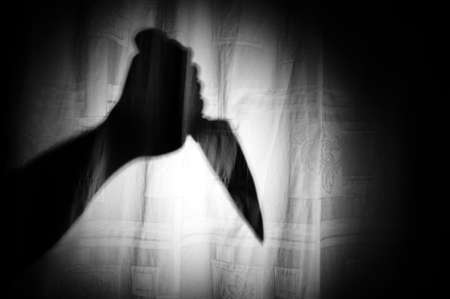 Scary Knife in Shadow Handの写真素材