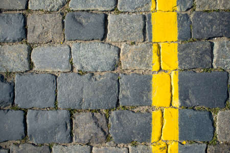 Paving Stone Texture with Yellow Lineの写真素材