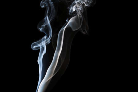 abstract blue smoke isolated on blackの写真素材