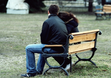 loving couple on a park benchの写真素材