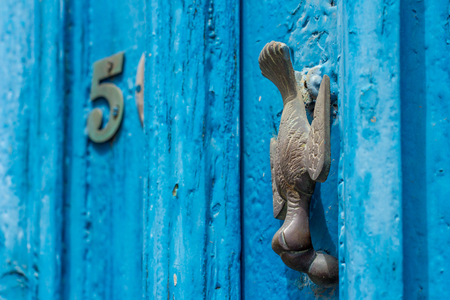 the original door handle in the form of a birdの写真素材