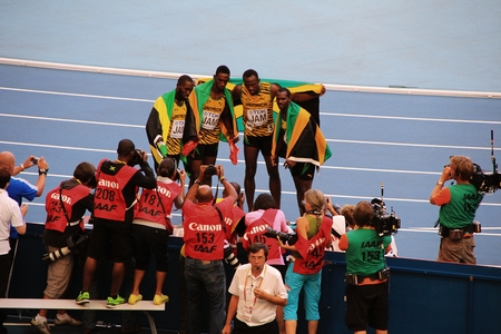 champion Usain St. Leo Bolt and others with flags, XIV IAAF World Championships, Moscow, 2013のeditorial素材
