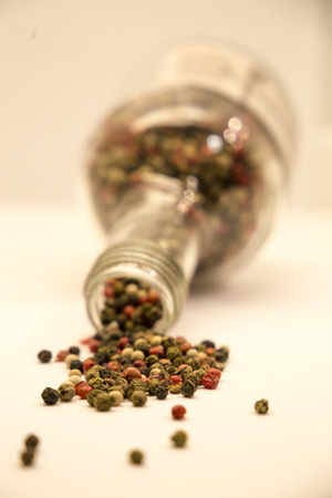 scattered grains of black pepperの写真素材