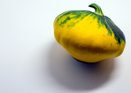 spotted patty squash on a white background. Isolated patisson.の写真素材