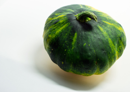 spotted patty squash on a white background. Isolated patisson.の写真素材